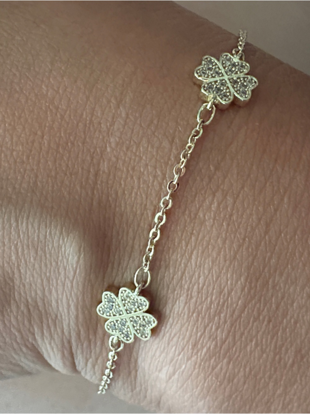Gold Four-Leaf Clover Bracelet with Sparkling Accents